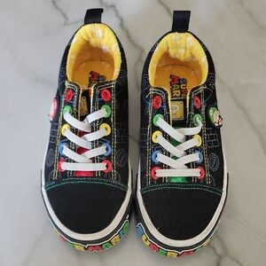 Nintendo Black and Yellow Sneakers with Playful Design